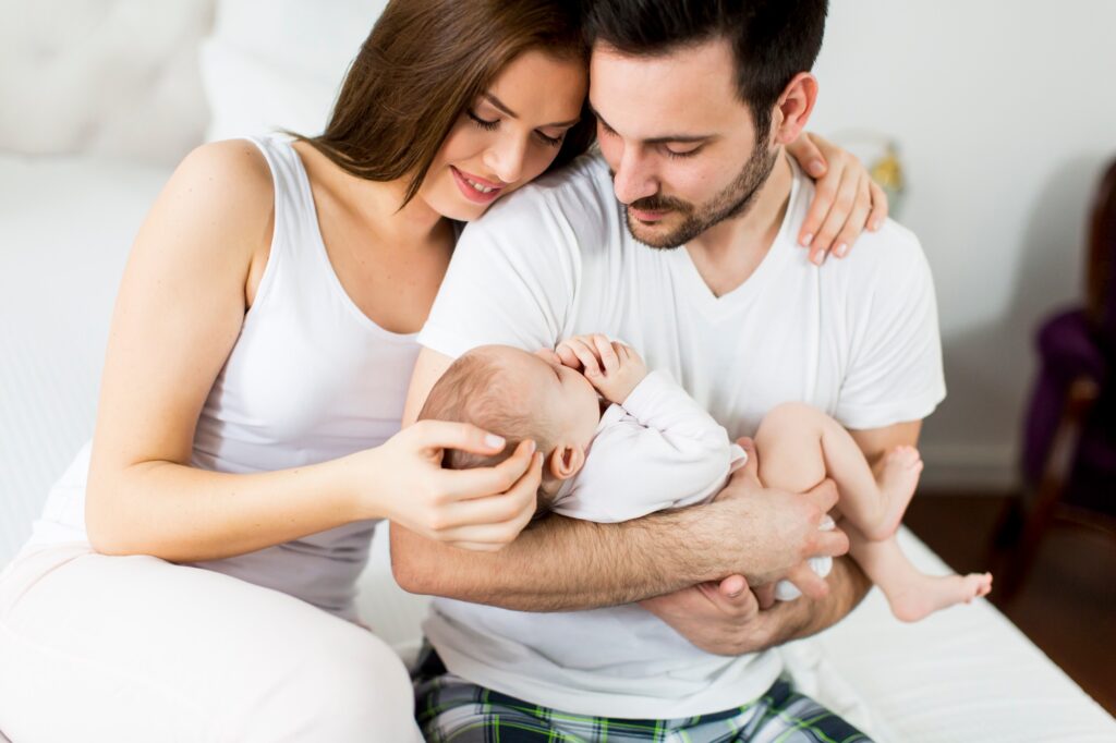 Happy family with newborn baby